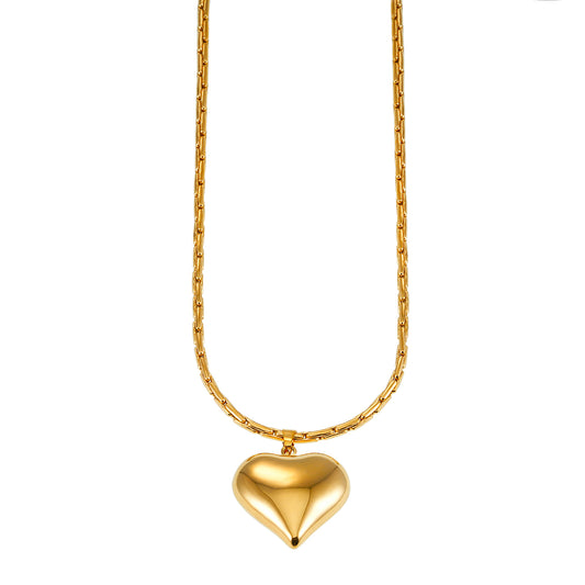 ABEL: Engineered Cable Chain with Puffy Heart Pendant in Gold.