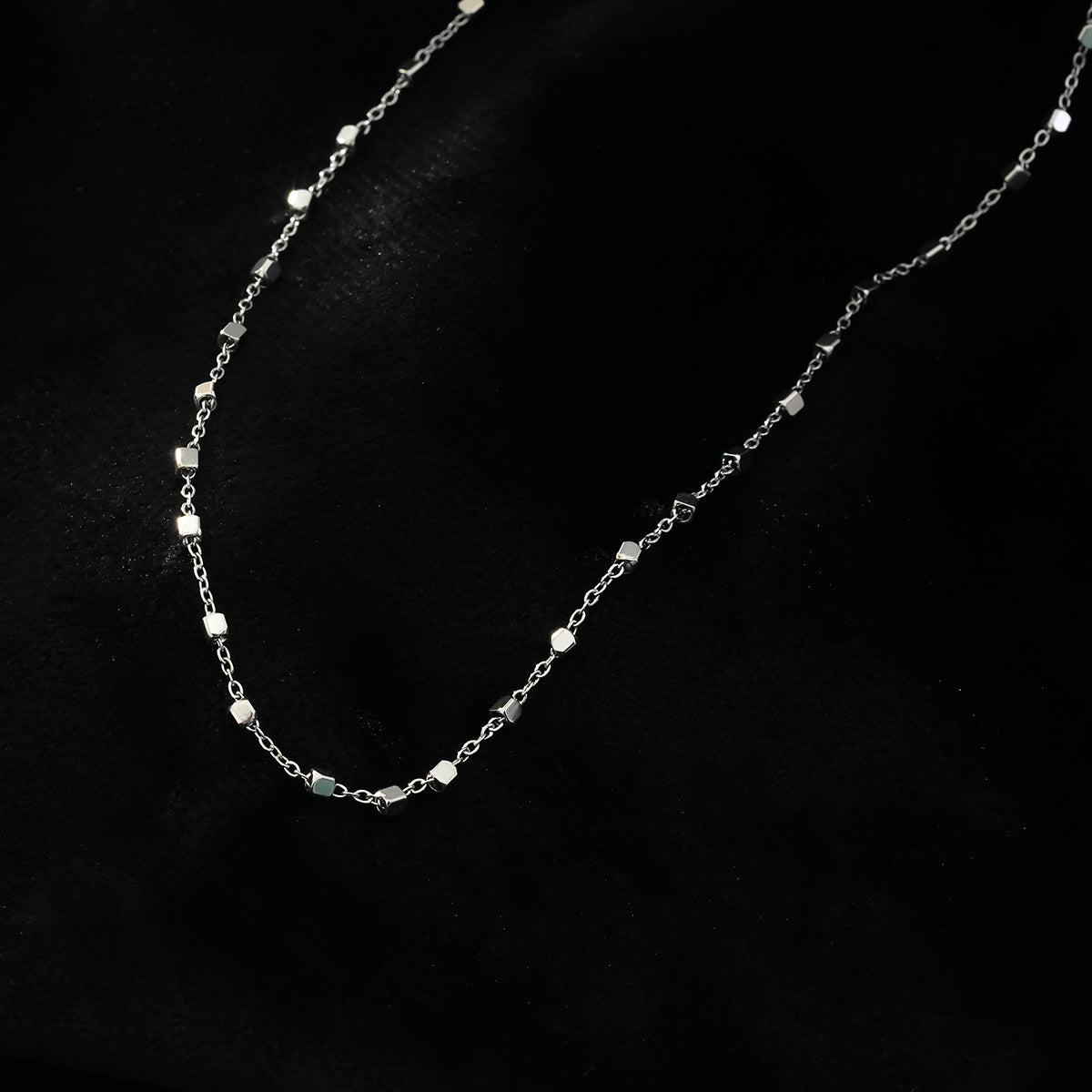 AUREOLE: Essential Daily Chain with Delicate Square Beads in Silver Toned White Gold.