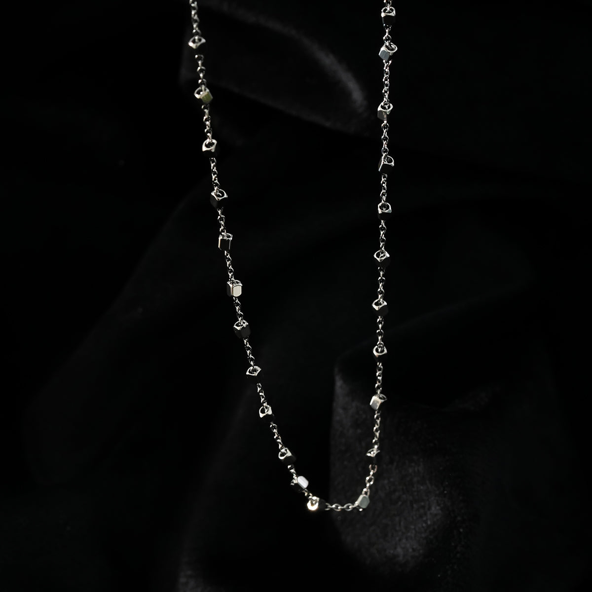 AUREOLE: Essential Daily Chain with Delicate Square Beads in Silver Toned White Gold.