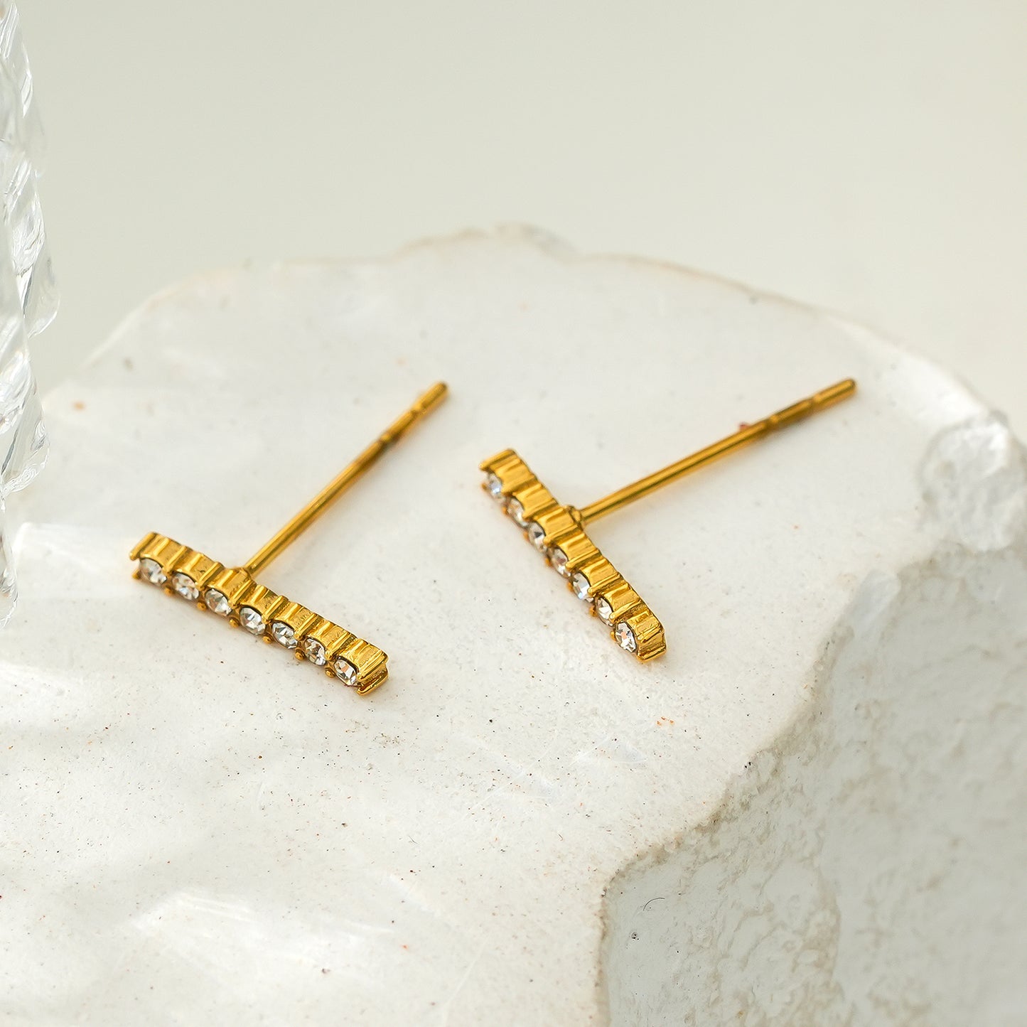 BIHAR: Minimalist Pavé Zirconia Embedded Bar Stud Earrings in Gold.