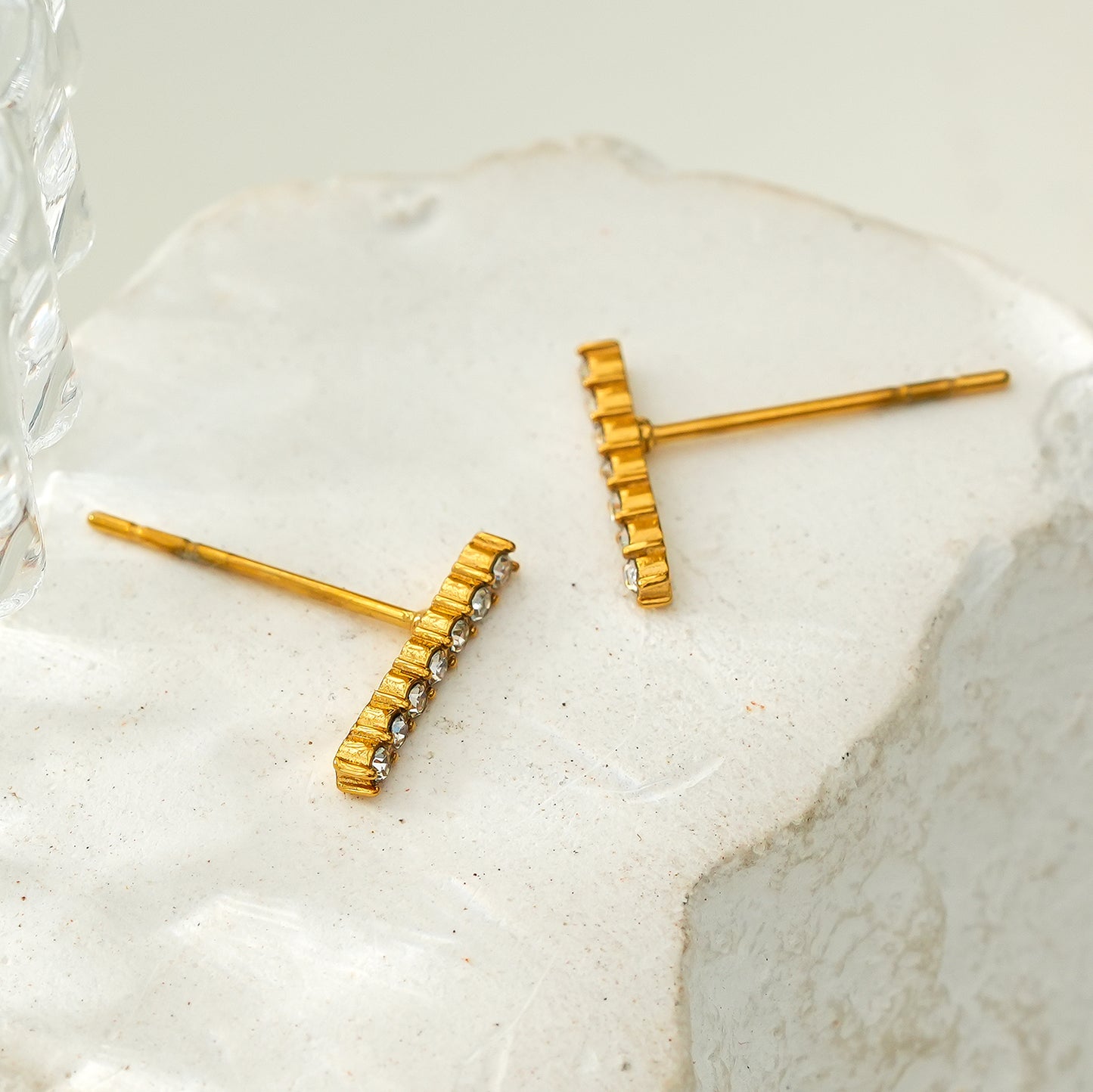 BIHAR: Minimalist Pavé Zirconia Embedded Bar Stud Earrings in Gold.