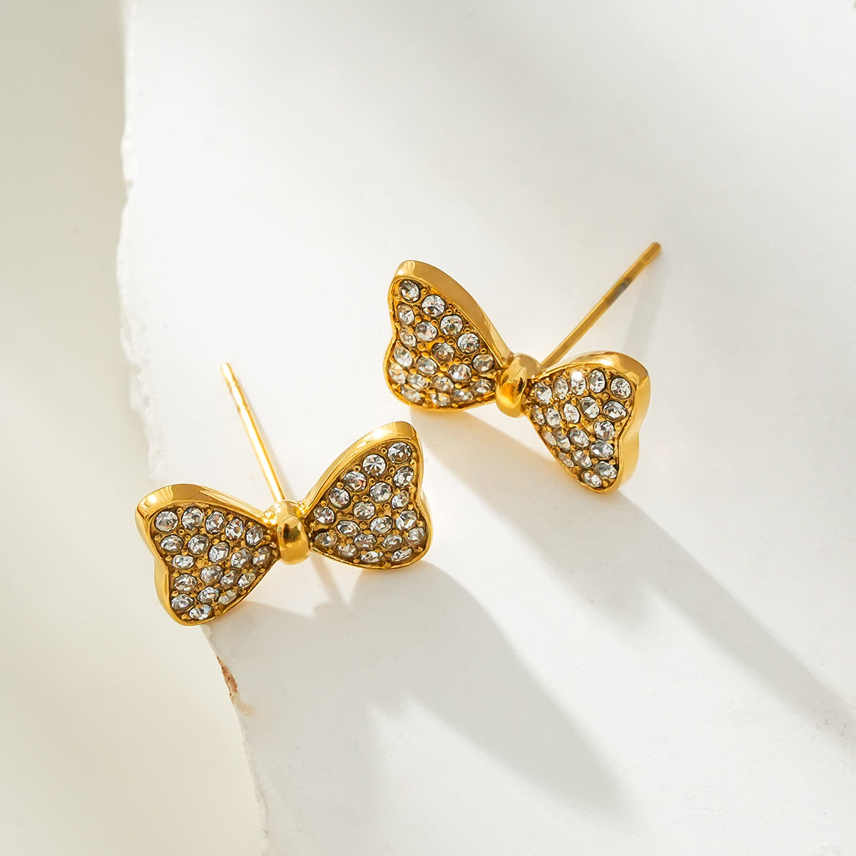 BOWEN: Bow-Shaped Stud Earrings with Pavé Zirconia (CZ) Sparkle.