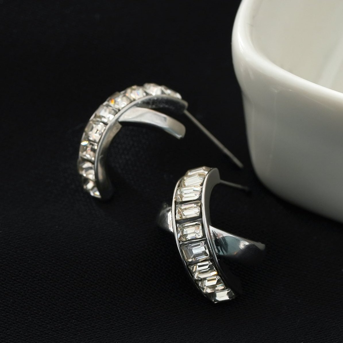 CARBIS: Retro Style Crossover Zirconia Embedded Earrings in White Gold (Silver Toned)