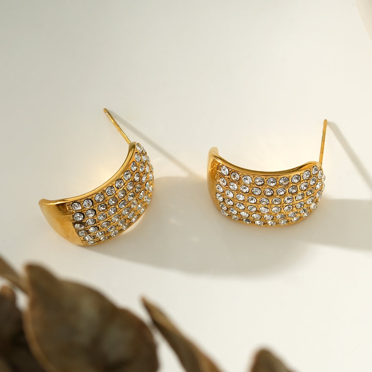 Style CARMEL: Curved Pavé Zirconia Stud Earrings in Gold