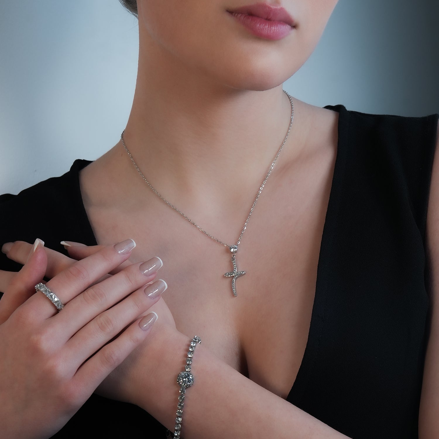 CRISTO Silver Toned White Gold: Dainty Beaded Chain Necklace with an Abstract Textured Cross Pendent