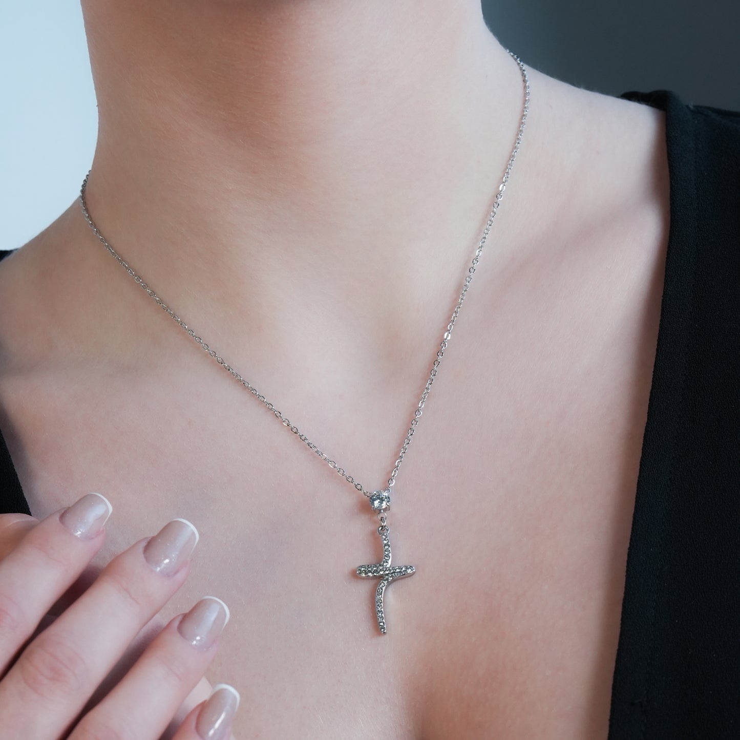 CRISTO Silver Toned White Gold: Dainty Beaded Chain Necklace with an Abstract Textured Cross Pendent