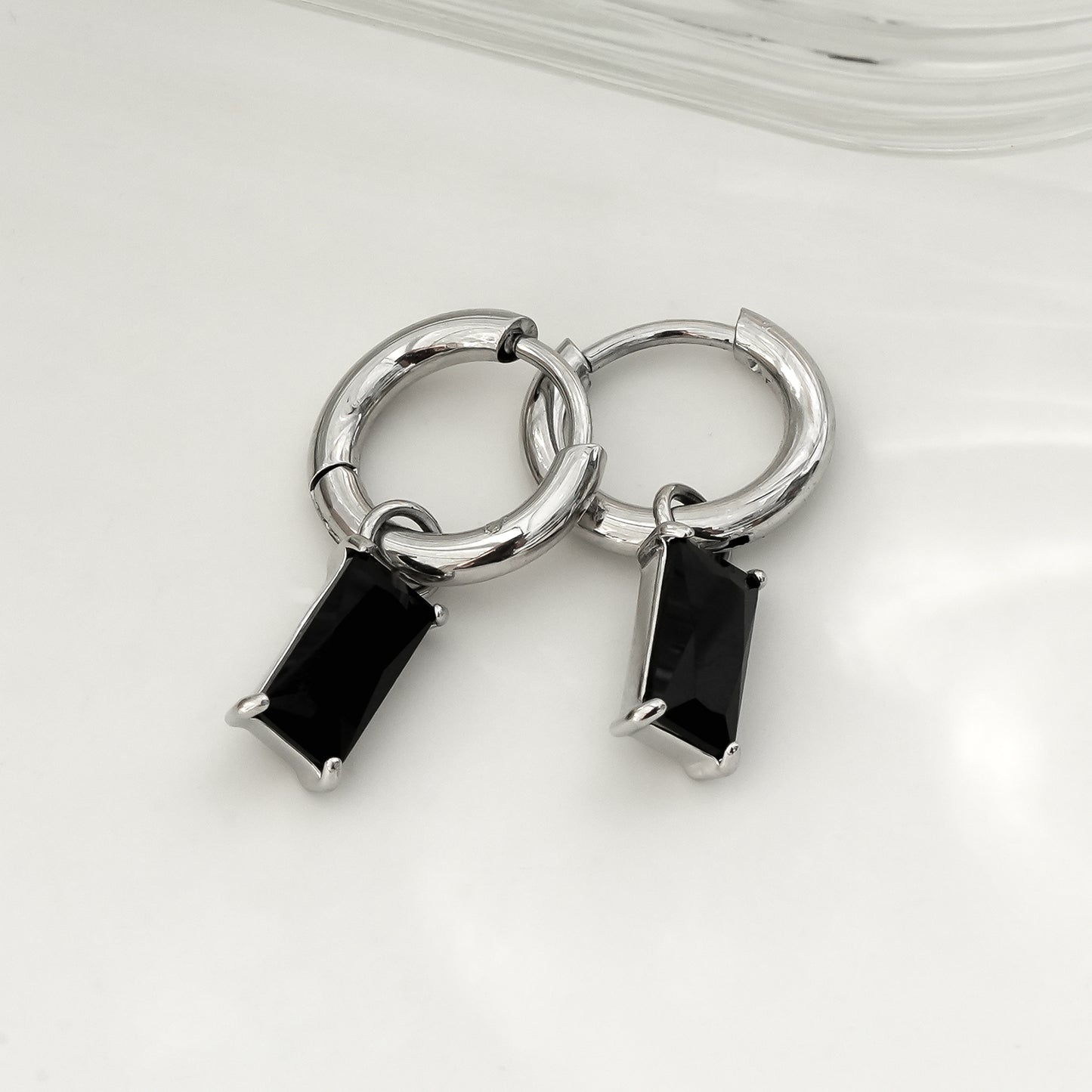 DAYSIA White Gold (Silver Toned):  Vintage Inspired Encased Black Crystal Drop Earrings.