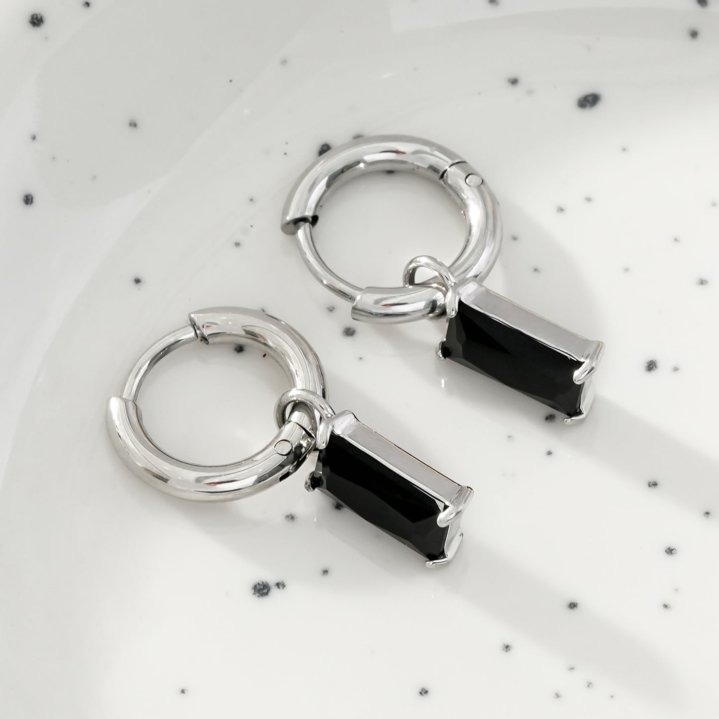 DAYSIA White Gold (Silver Toned):  Vintage Inspired Encased Black Crystal Drop Earrings.