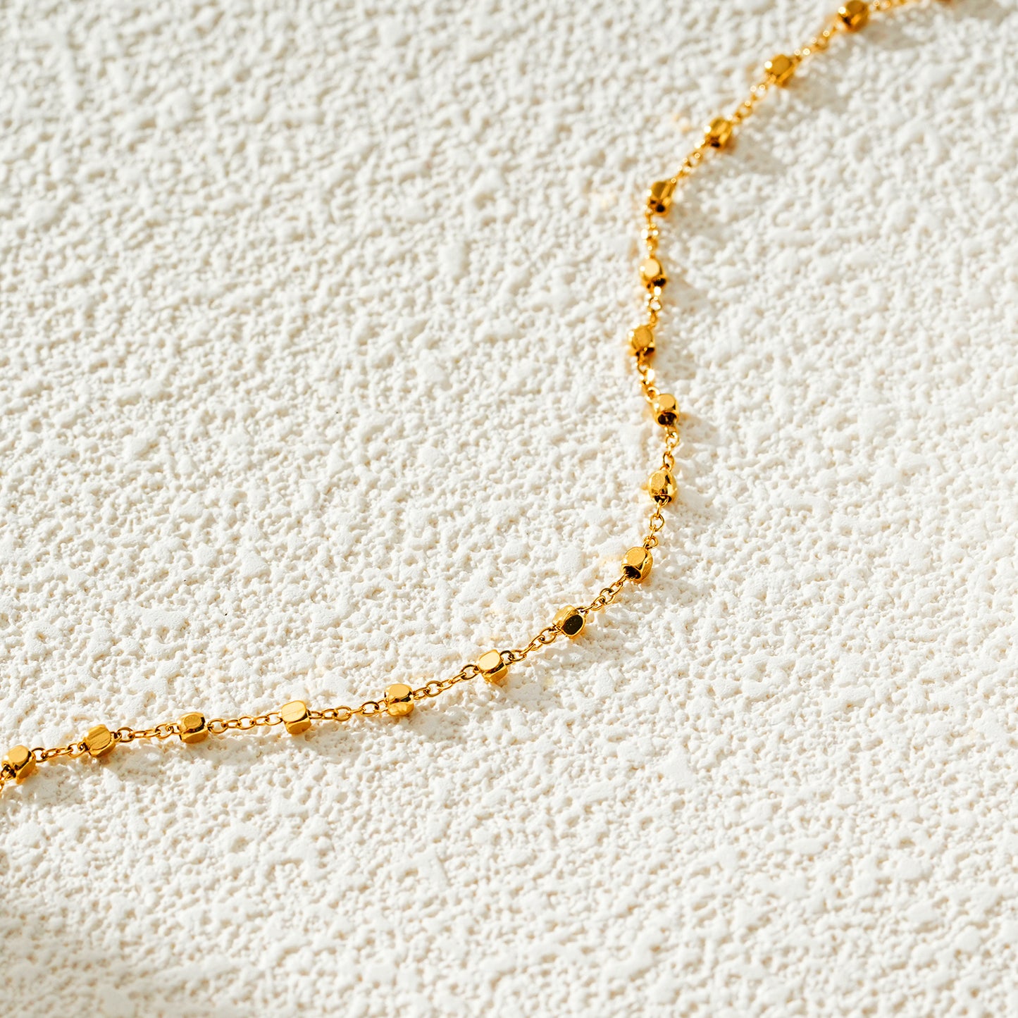 Style DEMELZA 8191G: Contemporary Gold Anklet with Delicate Square Beads.&nbsp;