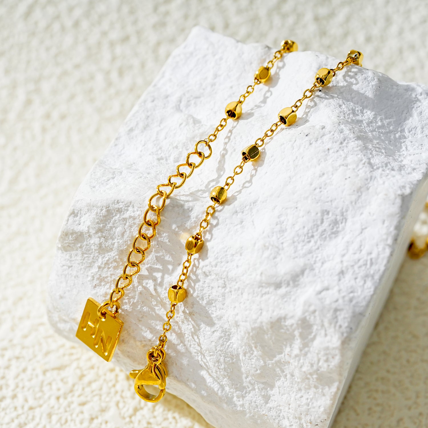 Style DEMELZA 8191G: Contemporary Gold Anklet with Delicate Square Beads.&nbsp;