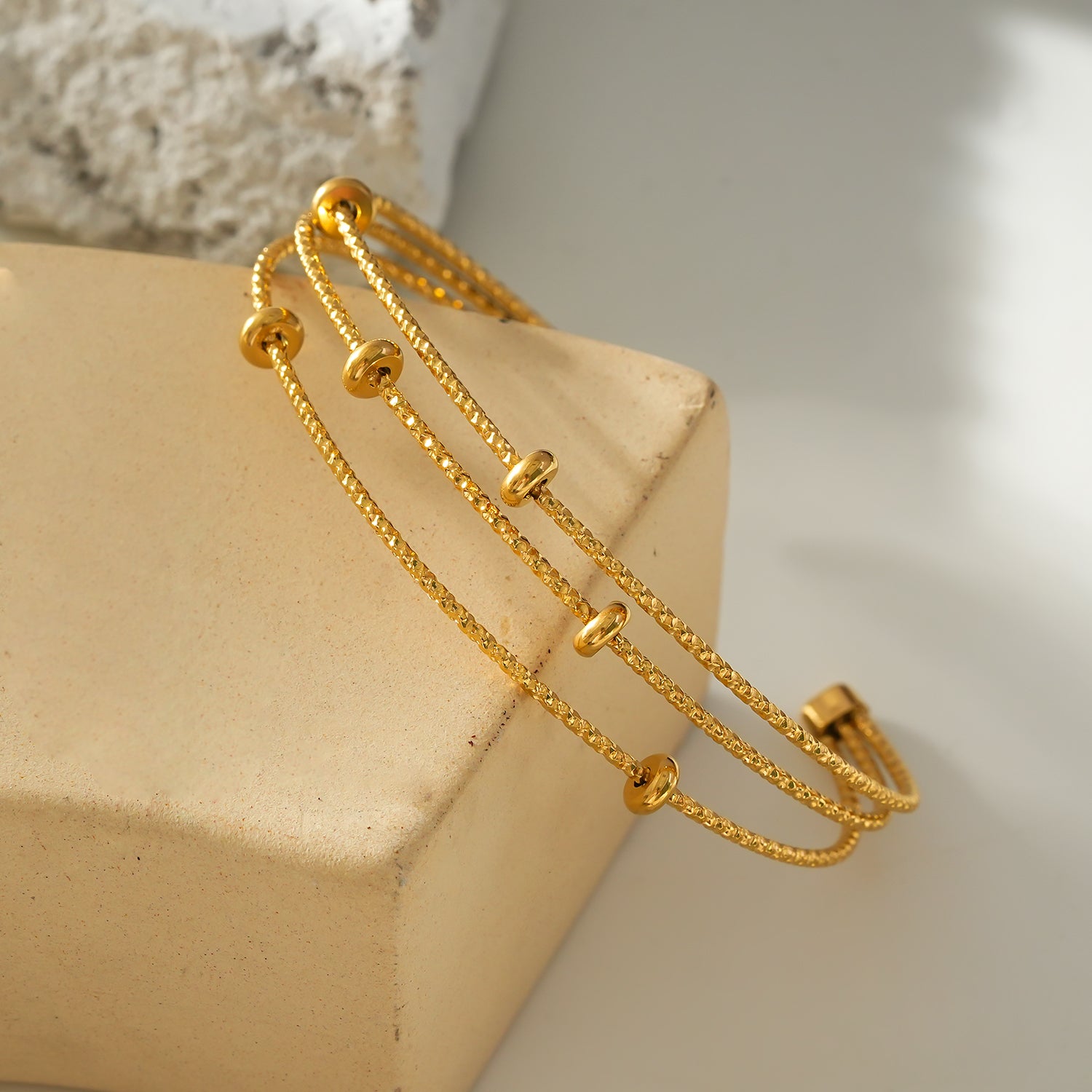 Style FARZIKA Gold: Triple Stacked Beaded Bracelet