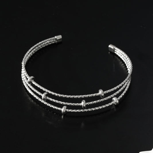 Style FARZIKA Silver: Triple Stacked Textured Beaded Bracelet