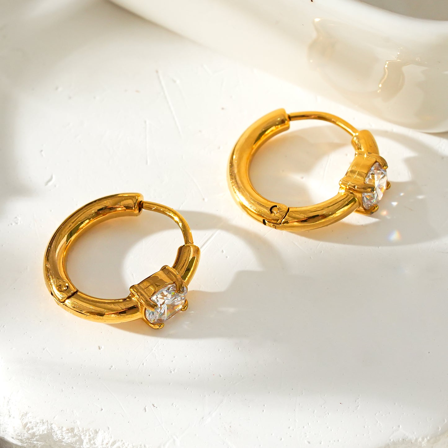 Style GALENA: Mini Hoop Gold Earrings with a Moissanite Stone