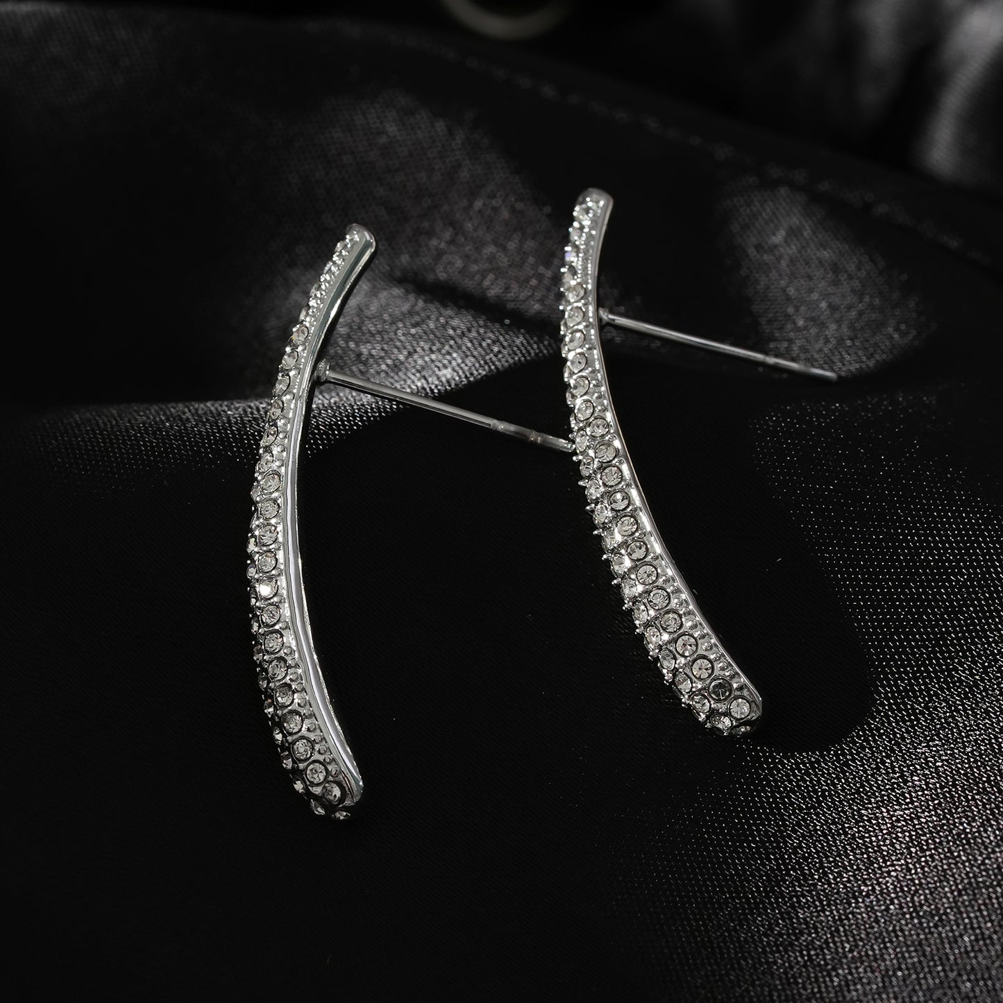 Style HILO: Curved Pavé Zirconia Shaped Stud Earrings in Silver