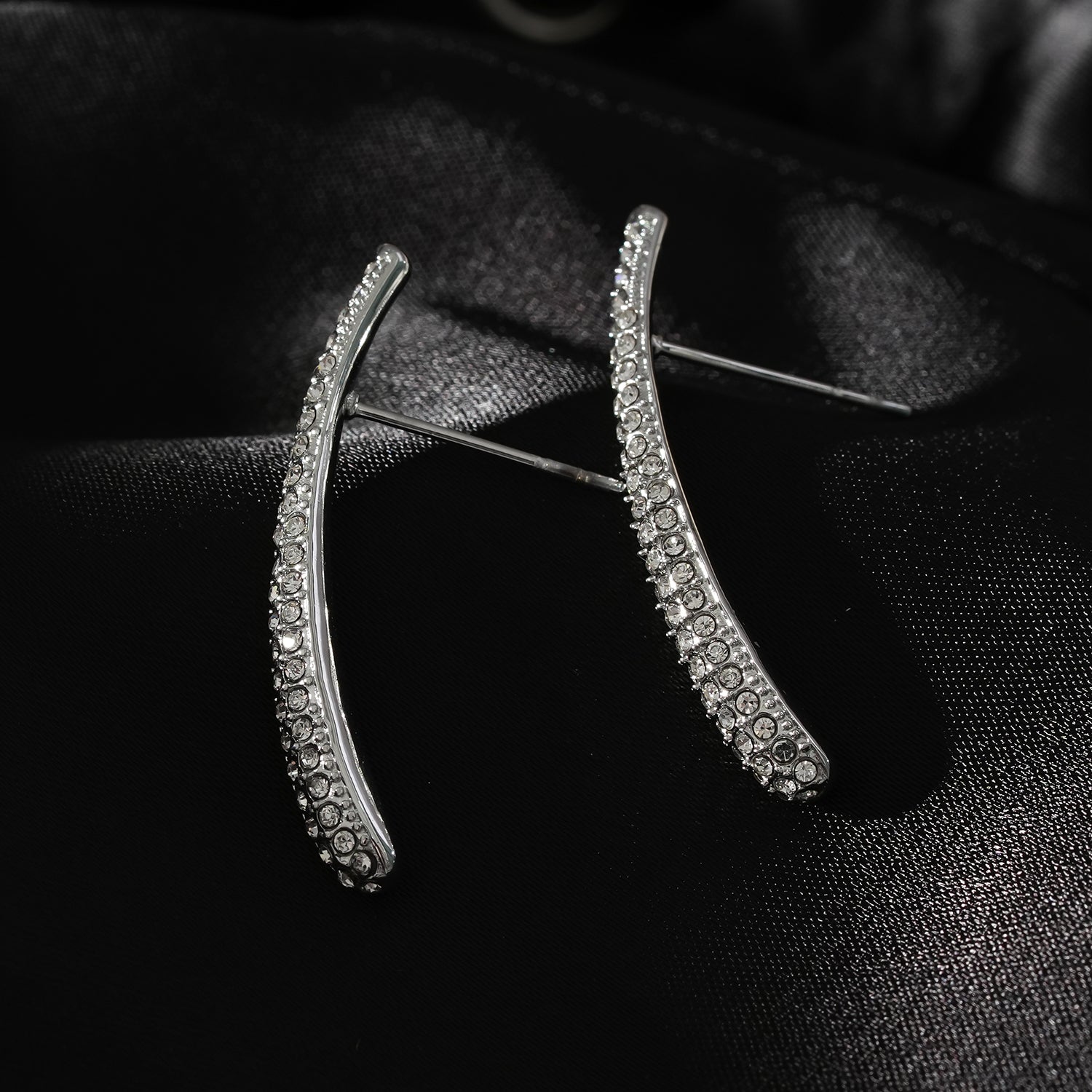 Style HILO: Curved Pavé Zirconia Shaped Stud Earrings in Silver