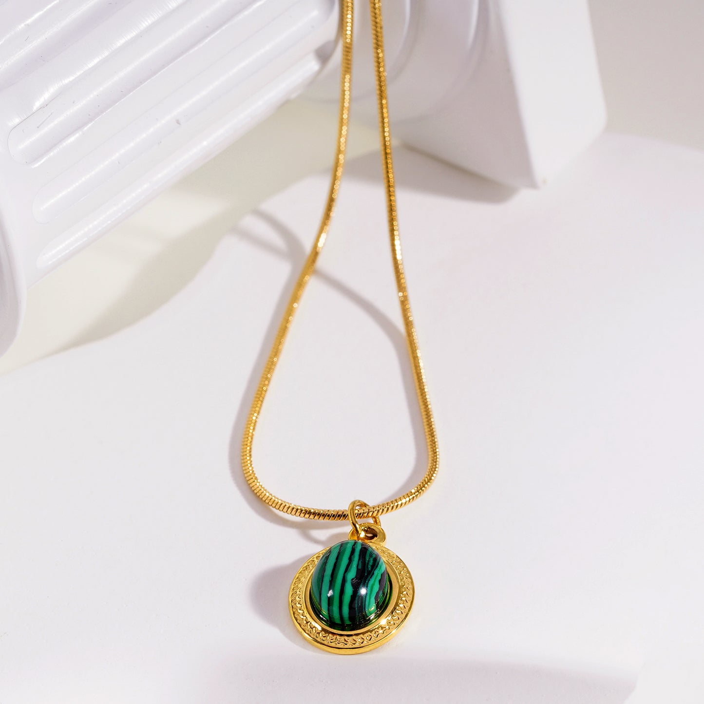 KRISTOS: Vintage Inspired Snake Skin Chain anchoring a Malachite Oval Pendant