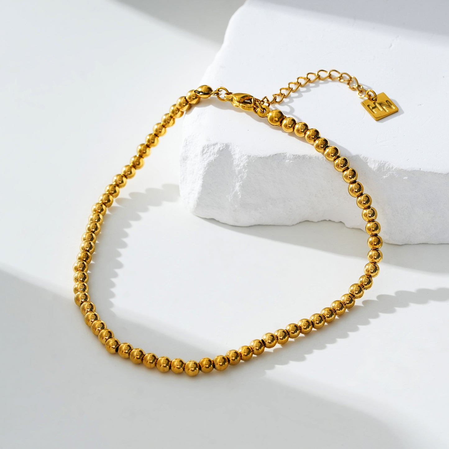 Style MANAMI LG 7750G: Ball-Beads Contemporary Chain Gold Anklet.