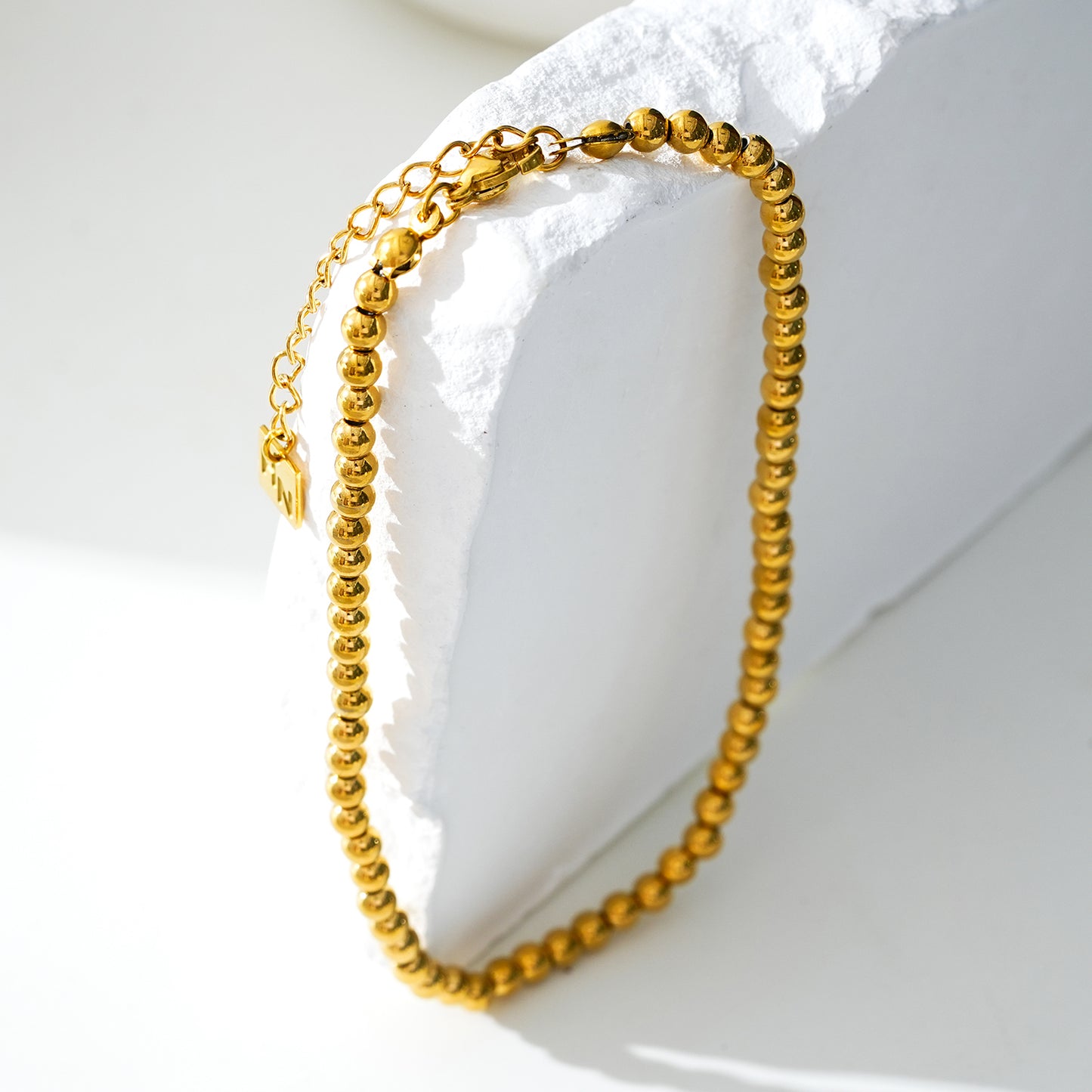 Style MANAMI LG 7750G: Ball-Beads Contemporary Chain Gold Anklet.