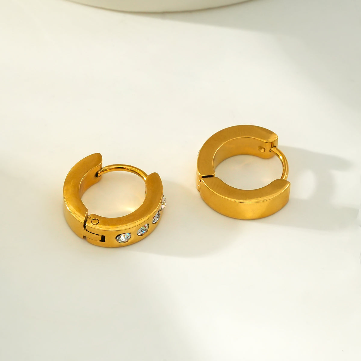 PAIA Gold: Wide Mini Hoop Gold Earrings with an Array of Zirconia (CZ) Gemstones