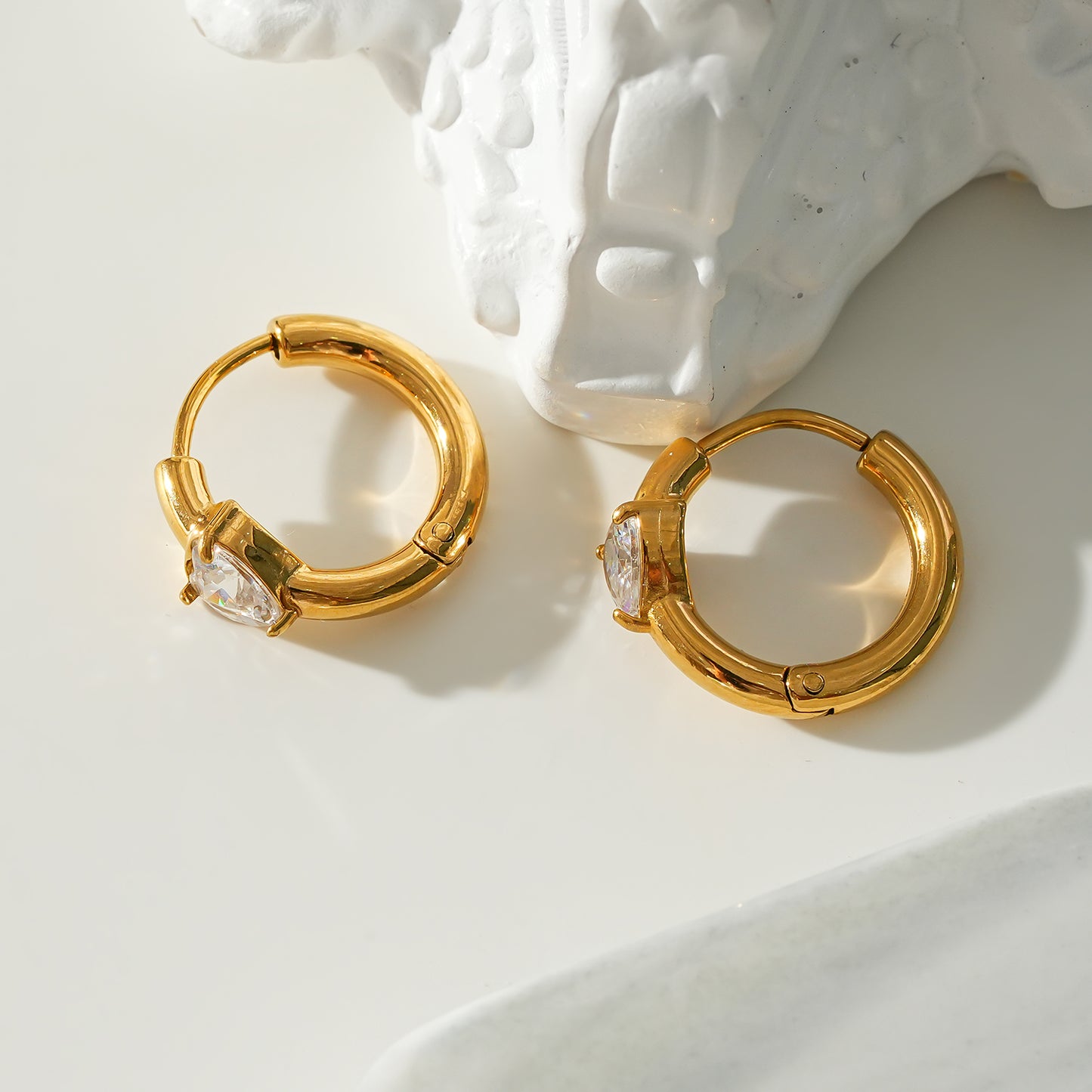 Style PELLE Gold: Mini Hoop Gold Earrings with Heart Shaped Moissanite