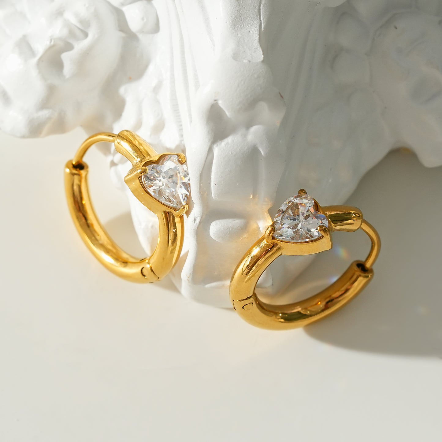 Style PELLE Gold: Mini Hoop Gold Earrings with Heart Shaped Moissanite