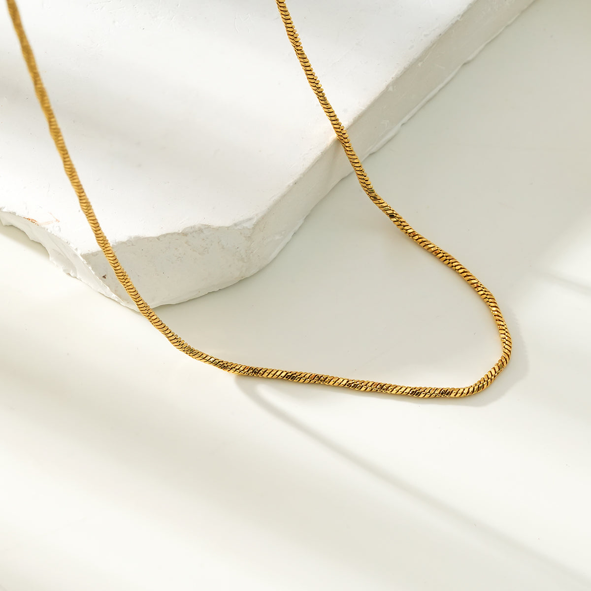 SKAGWAY: Twisted Textures Chain Necklace in Gold