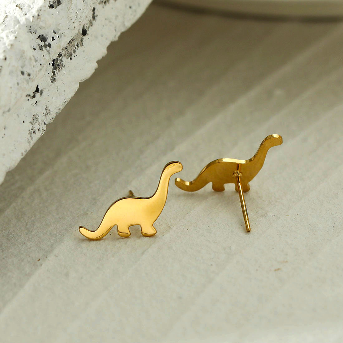 Dinosaur studs sale