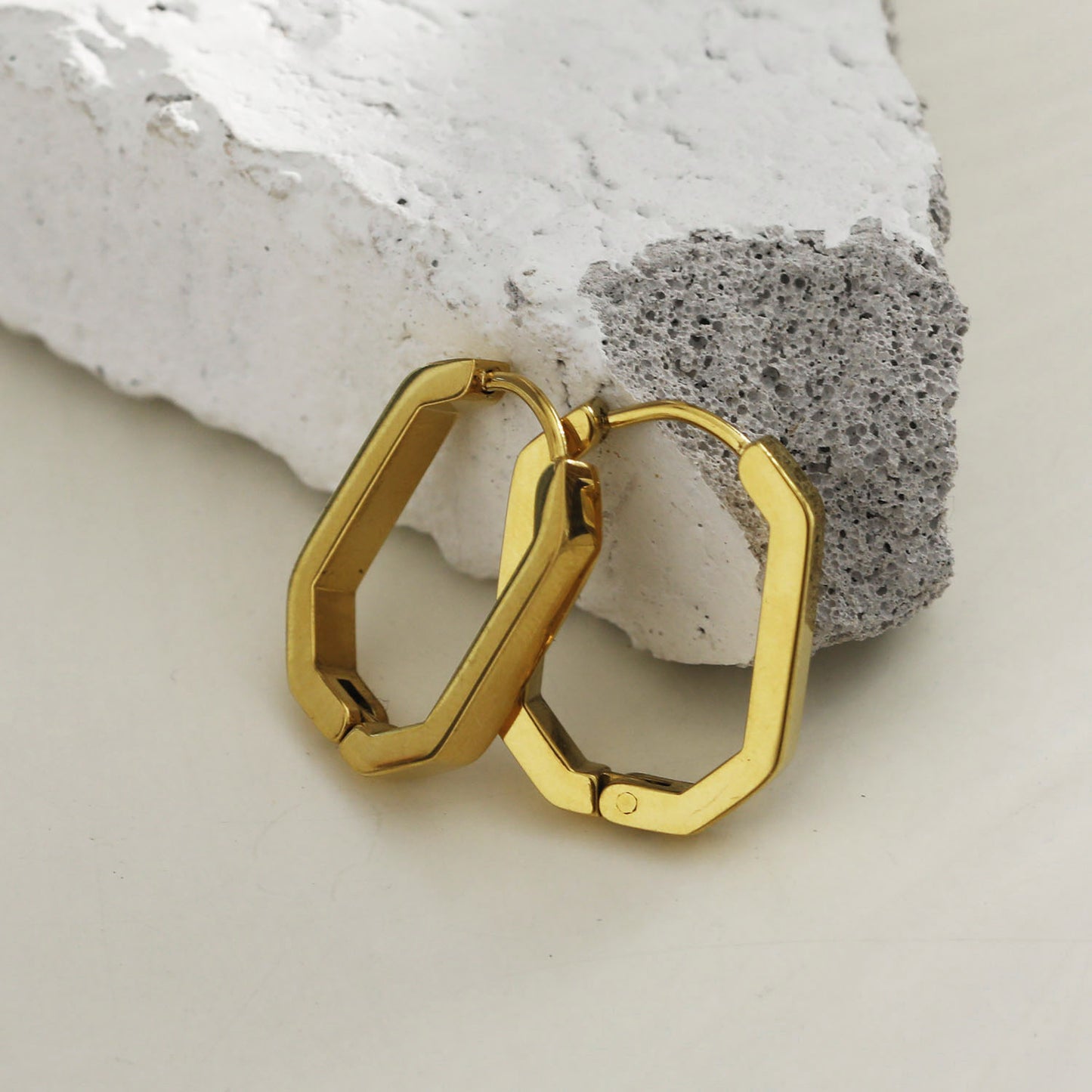 Style: CACCURI 122237 Geometric Shaped Contemporary Hoop Earrings.